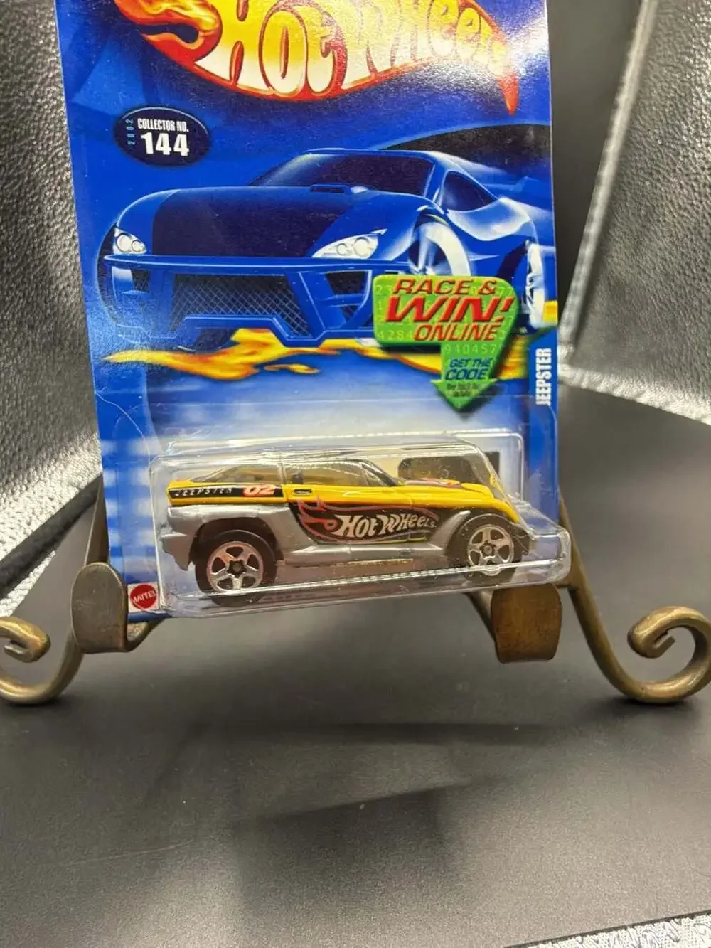 2002 Hot Wheels Jeepster Collector No. 144 Yellow Die-Cast Car